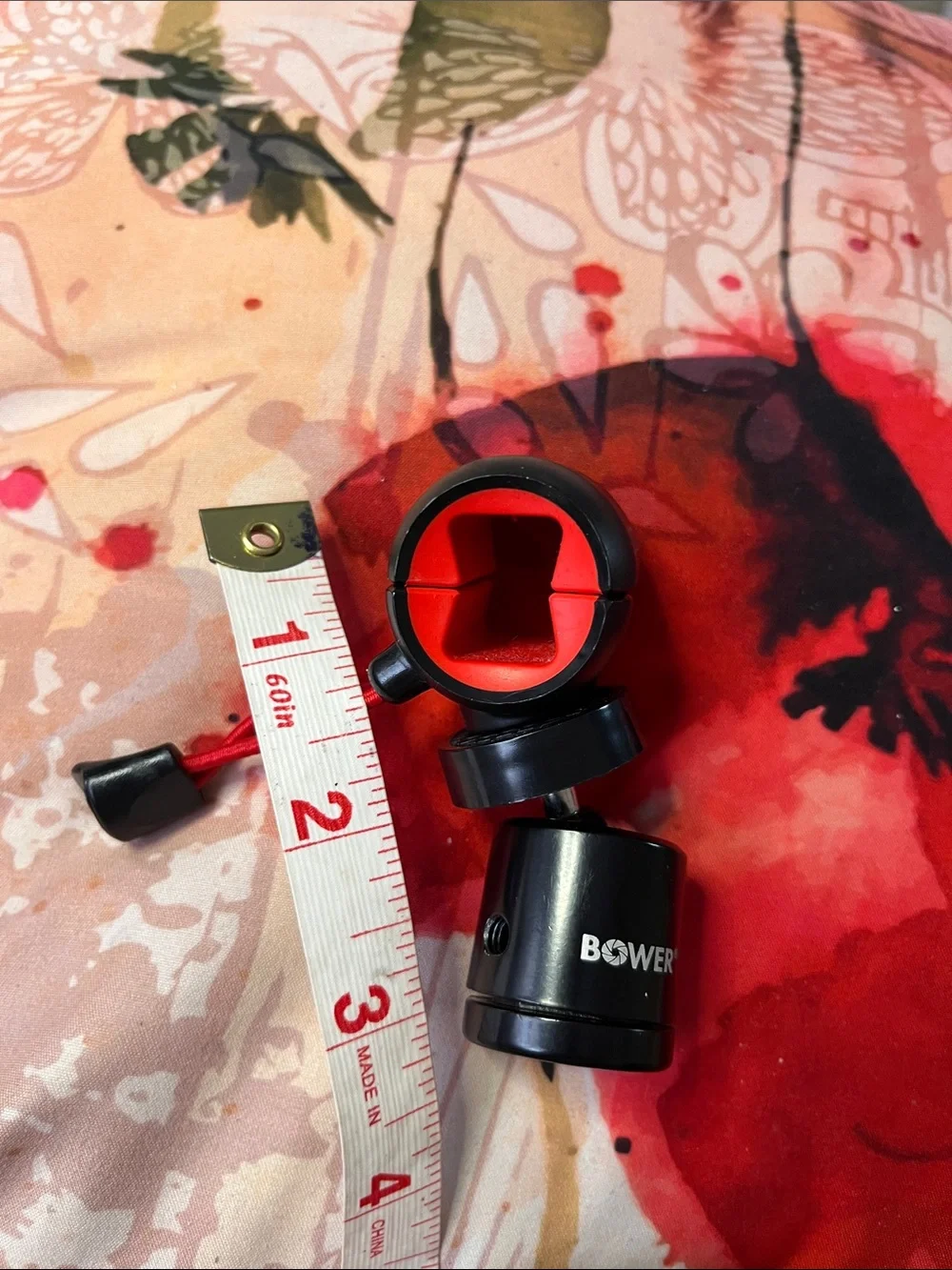 Black & Red Camera Tripod/Monopod Head Accessory
